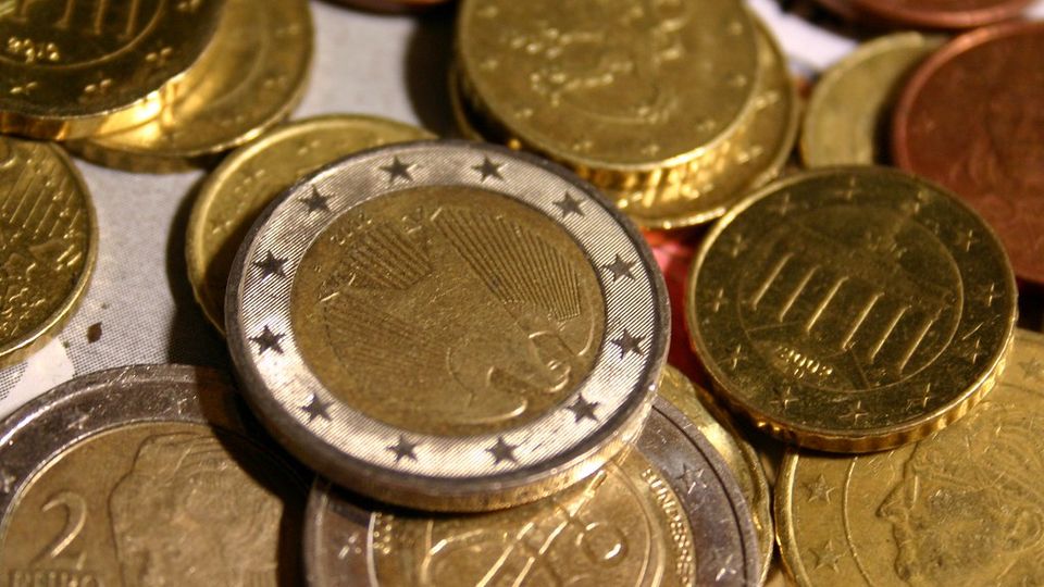 Assorted euro coins piled together