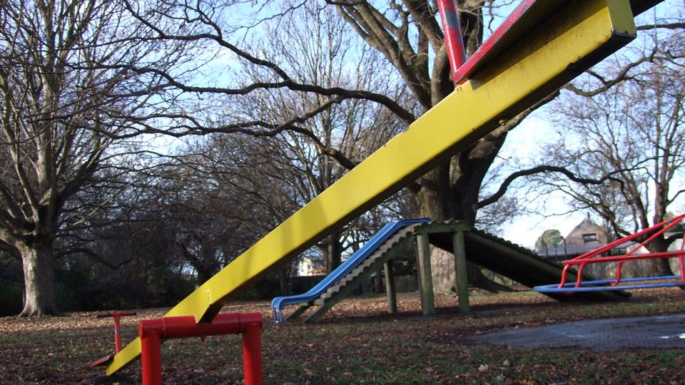 Yellow seesaw in a playground