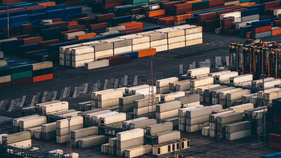 Aerial view of a container port packed with shipping containers