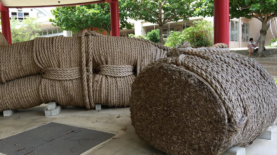 Huge coil of thick rope under a shelter